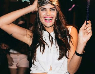 friends-partying-outdoors-with-confetti-and-sparkl-P7MPSHV.jpg